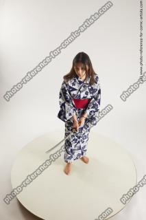 Japanese Woman Poses With Sword Saori